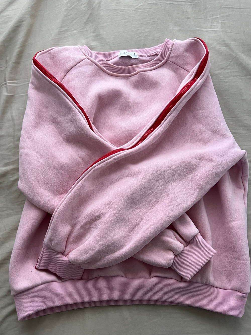 Pink Crewneck with Edgy Red Zipper Trim